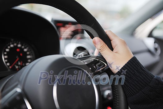 young man using new car navigation and onboard vehicle transport system