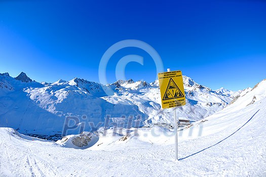 sign board at High mountains under fresh snow in the winter season sign board at High mountains under fresh snow in the winter season
