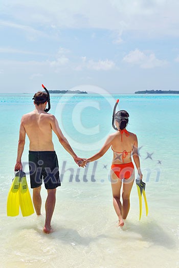 happy young romantic couple in love have fun running and relaxing on beautiful beach happy young romantic couple in love have fun running and relaxing on beautiful beach