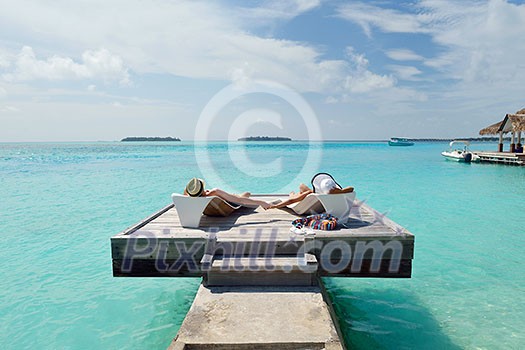 happy young romantic couple in love have fun running and relaxing on beautiful beach happy young romantic couple in love have fun running and relaxing on beautiful beach