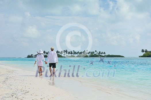 happy young romantic couple in love have fun running and relaxing on beautiful beach happy young romantic couple in love have fun running and relaxing on beautiful beach