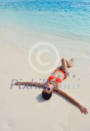 beautifel and happy woman girl on beach have fun and relax on summer vacation over the sea beautifel and happy woman girl on beach have fun and relax on summer vacation over the sea