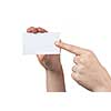 Woman hand holding empty visiting card and pointing on it isolated on white