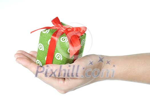 Hand holding gift isolated on white Hand holding gift isolated on white
