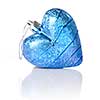 blue christmas ball in shape of heart isolated on white