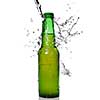 Green beer bottle with water splash isolated on white