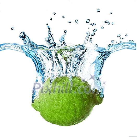 Fresh lime dropped into water with splash isolated on white Fresh lime dropped into water with splash isolated on white