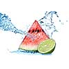 watermelon with lime and water splash isolated on white