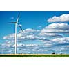 Wind generator turbines on summer landscape