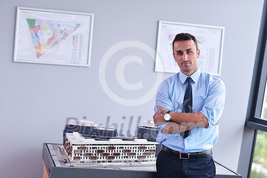 Single adult business man waiting for meeting to begin in Board room Single adult business man waiting for meeting to begin in Board room