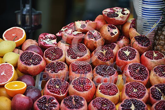 Colorful display of fruits background on traditional local market ready to made fresh juice drink Colorful display of fruits background on traditional local market ready to made fresh juice drink