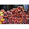 Colorful display of fruits background  on traditional local market ready to made fresh juice drink
