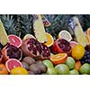 Colorful display of fruits background  on traditional local market ready to made fresh juice drink