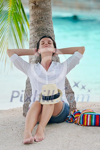 beautifel and happy woman girl on beach have fun and relax on summer vacation over the beautiful tropical sea beautifel and happy woman girl on beach have fun and relax on summer vacation over the beautiful tropical sea
