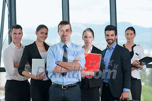 Group of happy young business people in a meeting at office Group of happy young business people in a meeting at office