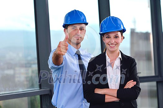 Group of happy young business people in a meeting at office Group of happy young business people in a meeting at office