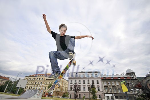 Boy practicing skate in a skate park 