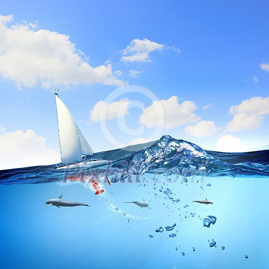 Floating yacht and dolphins swimming under water Floating yacht and dolphins swimming under water
