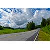 Country road after rain in agricultural environment