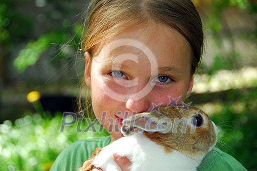 Young girl holding a bunny Young girl holding a bunny