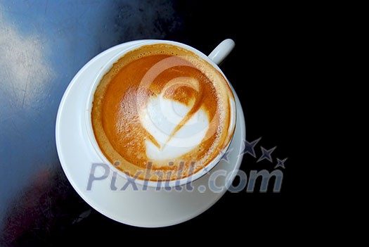 Cappuccino with heart shape on foam Cappuccino with heart shape on foam