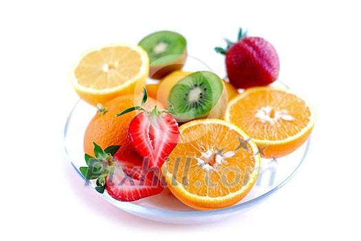 Fruits in a bowl on white background