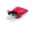 Pearls in red pouch on white background