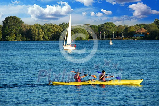 Fast moving kayak on a lake Fast moving kayak on a lake