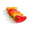 Colorful peppers aligned in perspective on white background