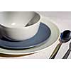 Dinner place setting  - plates bowl and cutlery