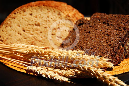 Two types of rye bread with rye ears
