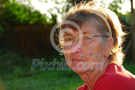 Portrait of a senior woman outside