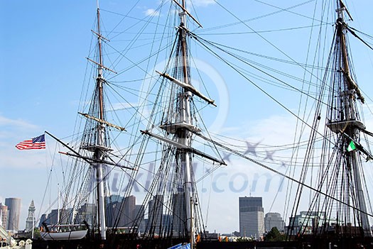 Masts of USS Constitution with Boston skyline in the background Masts of USS Constitution with Boston skyline in the background