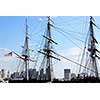 Masts of USS Constitution with Boston skyline in the background