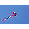 Kite with american flag colors flying in clear blue sky