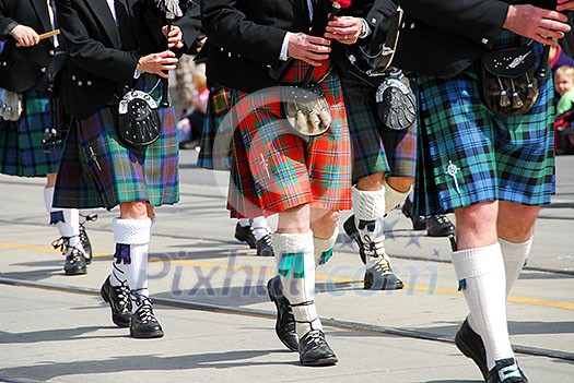 Scottish marching band at city parade Scottish marching band at city parade
