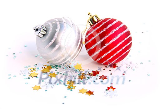 Two christmas glass balls on white background