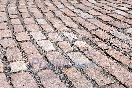 Abstract background of old granite cobblestone pavement Abstract background of old granite cobblestone pavement
