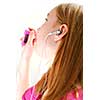Young girl listening to music on her mp3 player white background