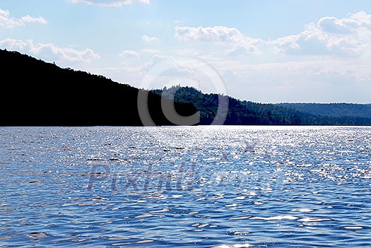 Sparkiling blue lake in Algonquin provincial park, Canada Sparkiling blue lake in Algonquin provincial park, Canada