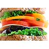 Big healthy sandwich with vegetables and meat close up