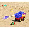 Children's sand plastic toys on a beach