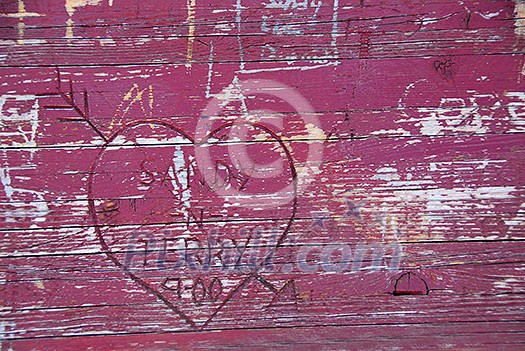 Abstract background of old wood surface with carved graffiti Abstract background of old wood surface with carved graffiti