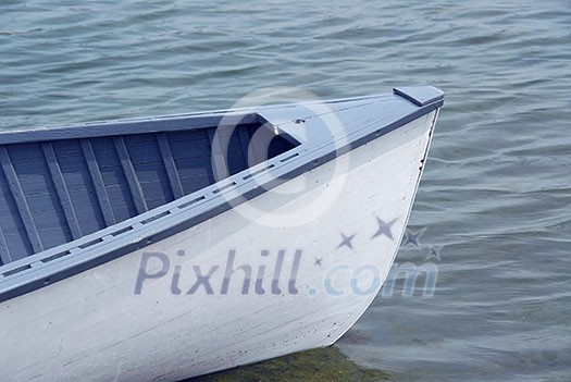 Nose of a blue wooden boat closeup