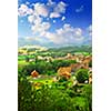 Rural landscape with hills and a small village in eastern France