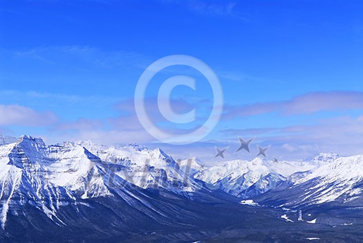 Snowy mountain ridges at Lake Louise in Canadian Rocky mountains Snowy mountain ridges at Lake Louise in Canadian Rocky mountains