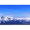 Snowy mountain ridges at Lake Louise in Canadian Rocky mountains