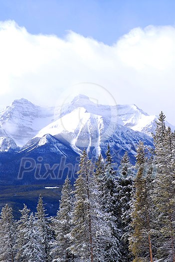 Snowy mountain ridges at Lake Louise in Canadian Rocky mountains Snowy mountain ridges at Lake Louise in Canadian Rocky mountains