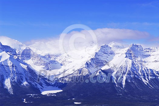 Snowy mountain ridge at Lake Louise in Canadian Rockies in winter Snowy mountain ridge at Lake Louise in Canadian Rockies in winter