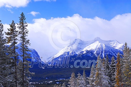 Snowy mountain ridge at Lake Louise ski resort in Canadian Rockies Snowy mountain ridge at Lake Louise ski resort in Canadian Rockies